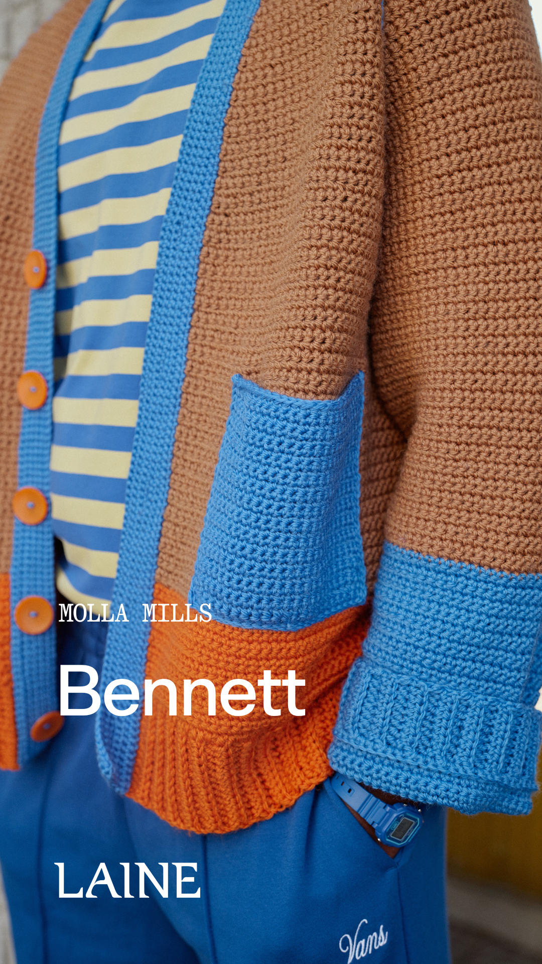 Crocheted Bennett cardigan designed by Molla Mills with blue sleeves and brown body