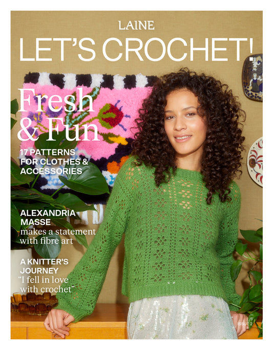 Magazine cover featuring a woman wearing a green crochet sweater with colorful yarn in the background.